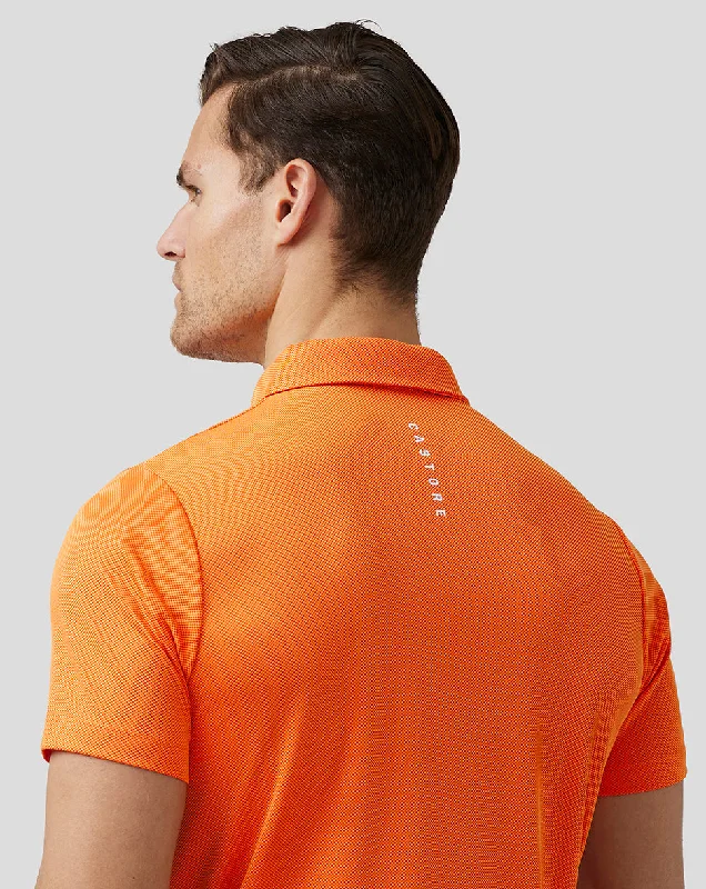 Men’s Golf Engineered Knit Polo - Deep Orange